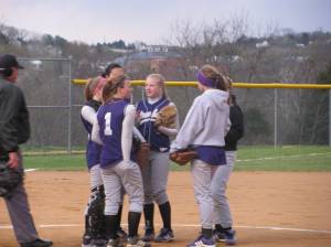 Meeting at the mound for the Rams
