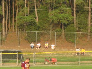 Fans in the owners box down the right field line.