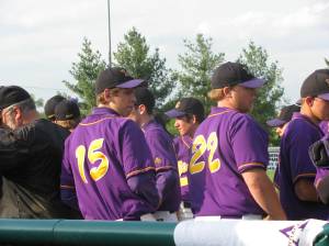 Group meeting in between innings.